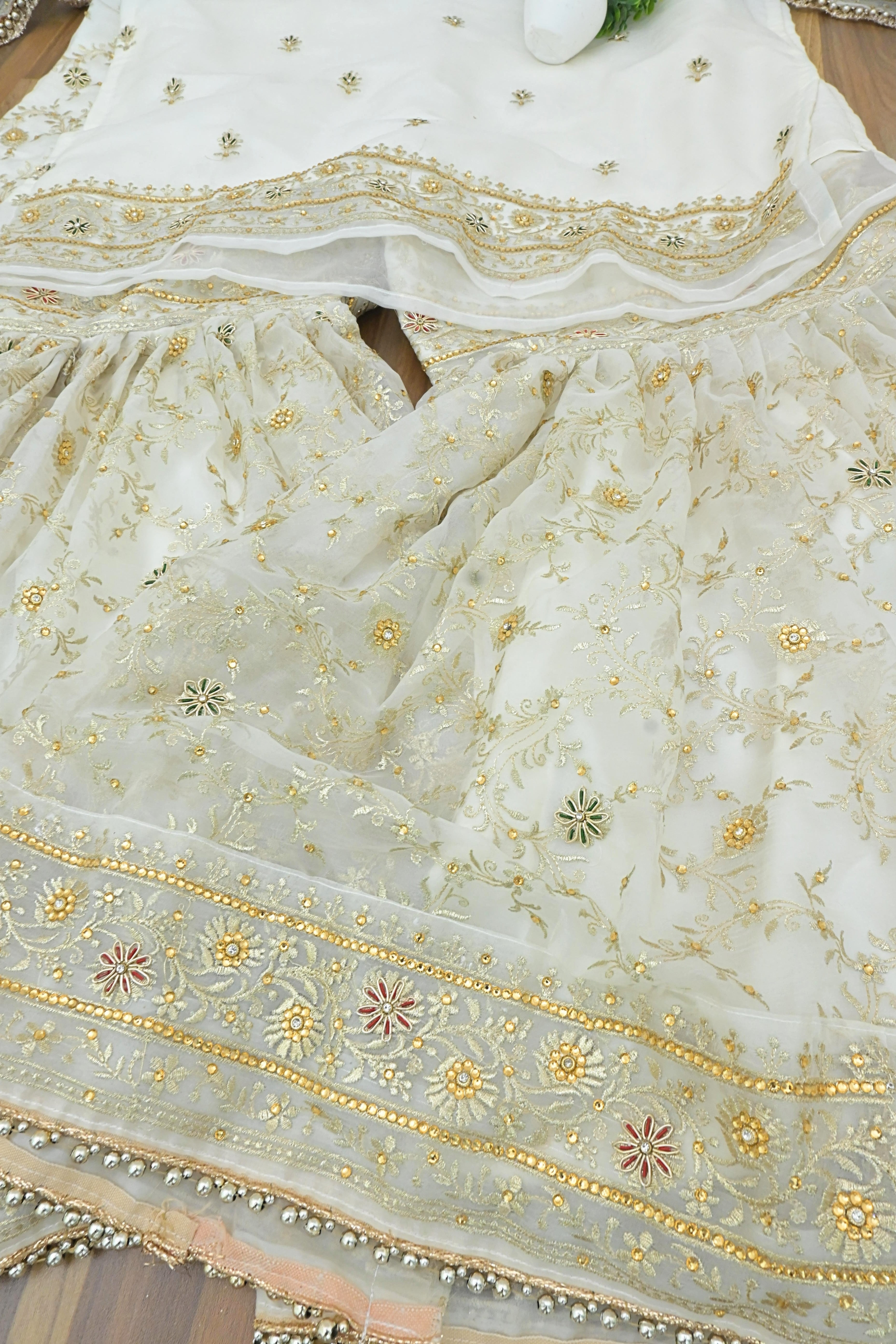 Off white handwork meenakari embroiderded gharara