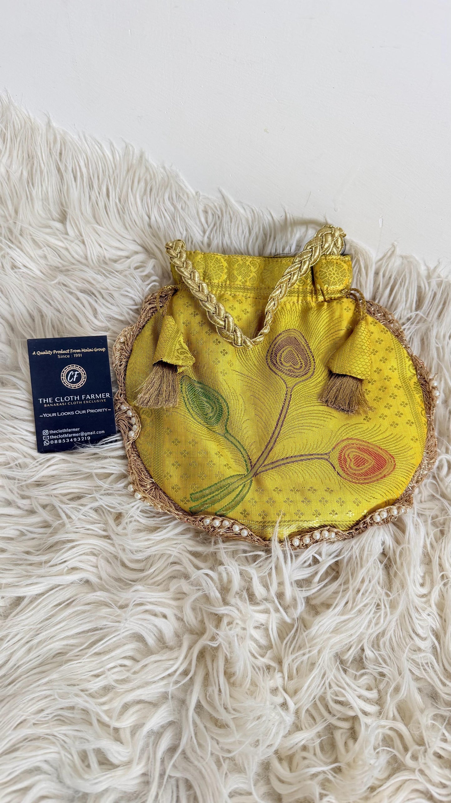 BANARASI YELLOW COLOR MORPANKHI POTLI