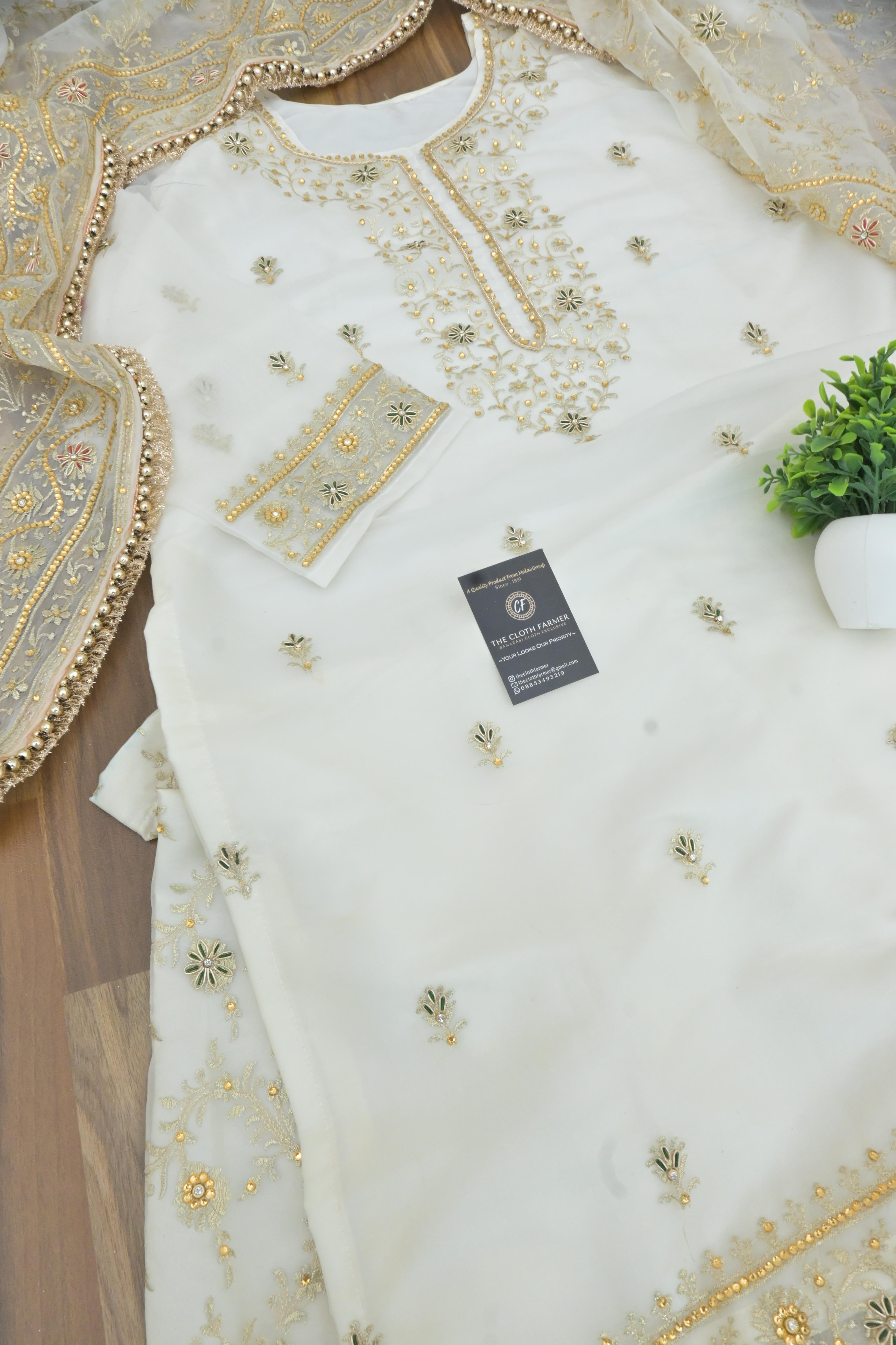 Off white handwork meenakari embroiderded gharara