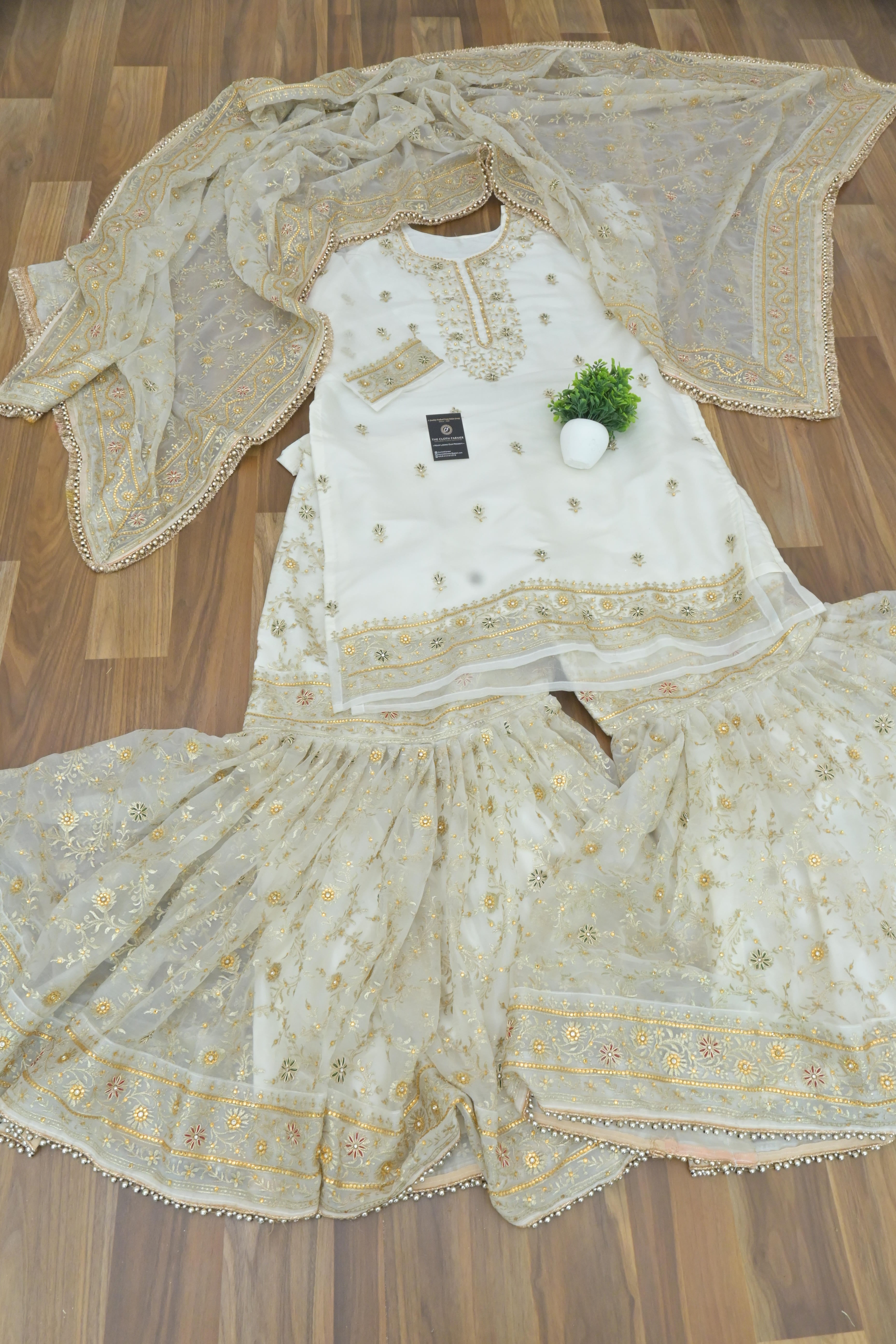 Off white handwork meenakari embroiderded gharara