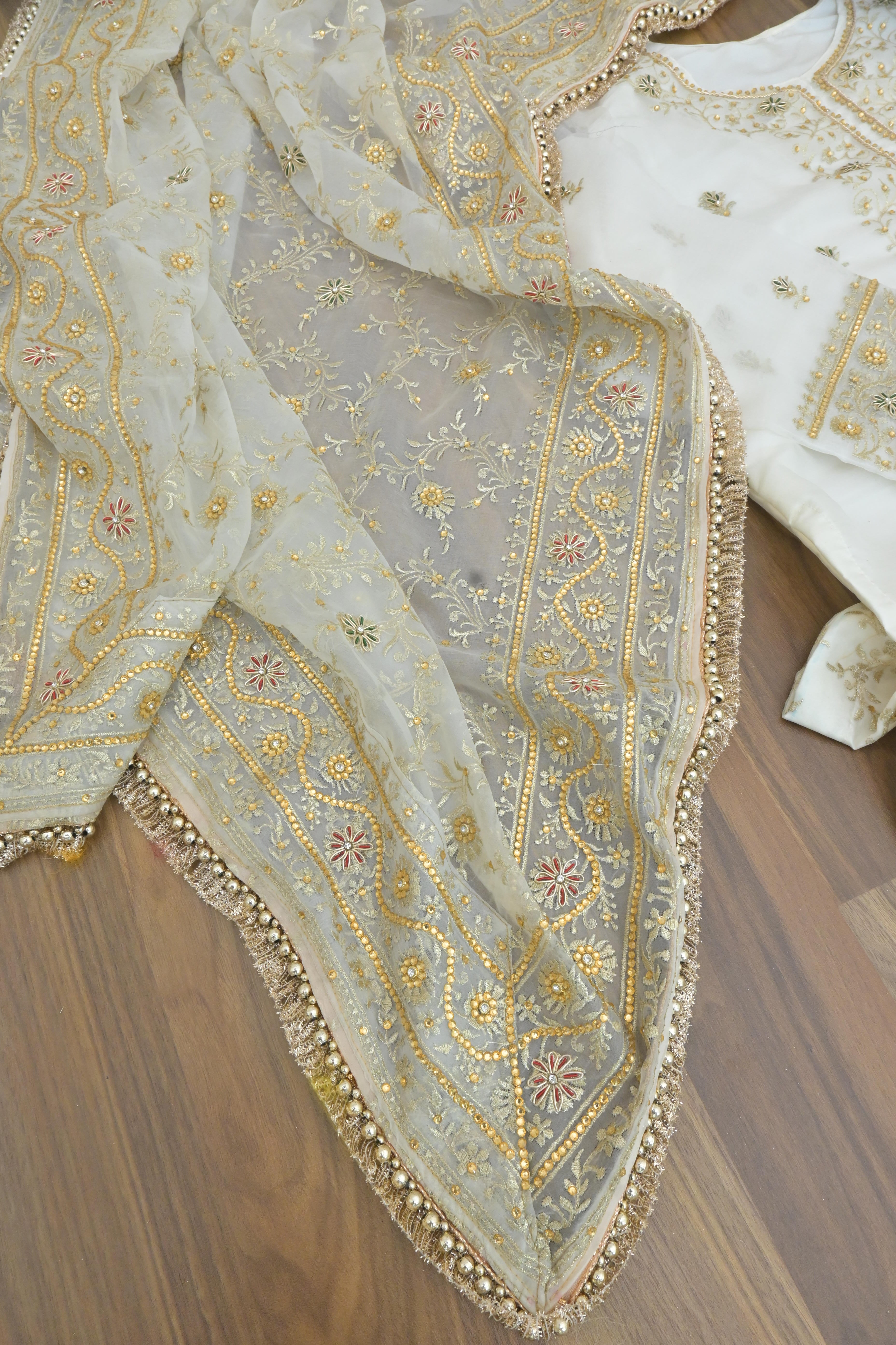 Off white handwork meenakari embroiderded gharara