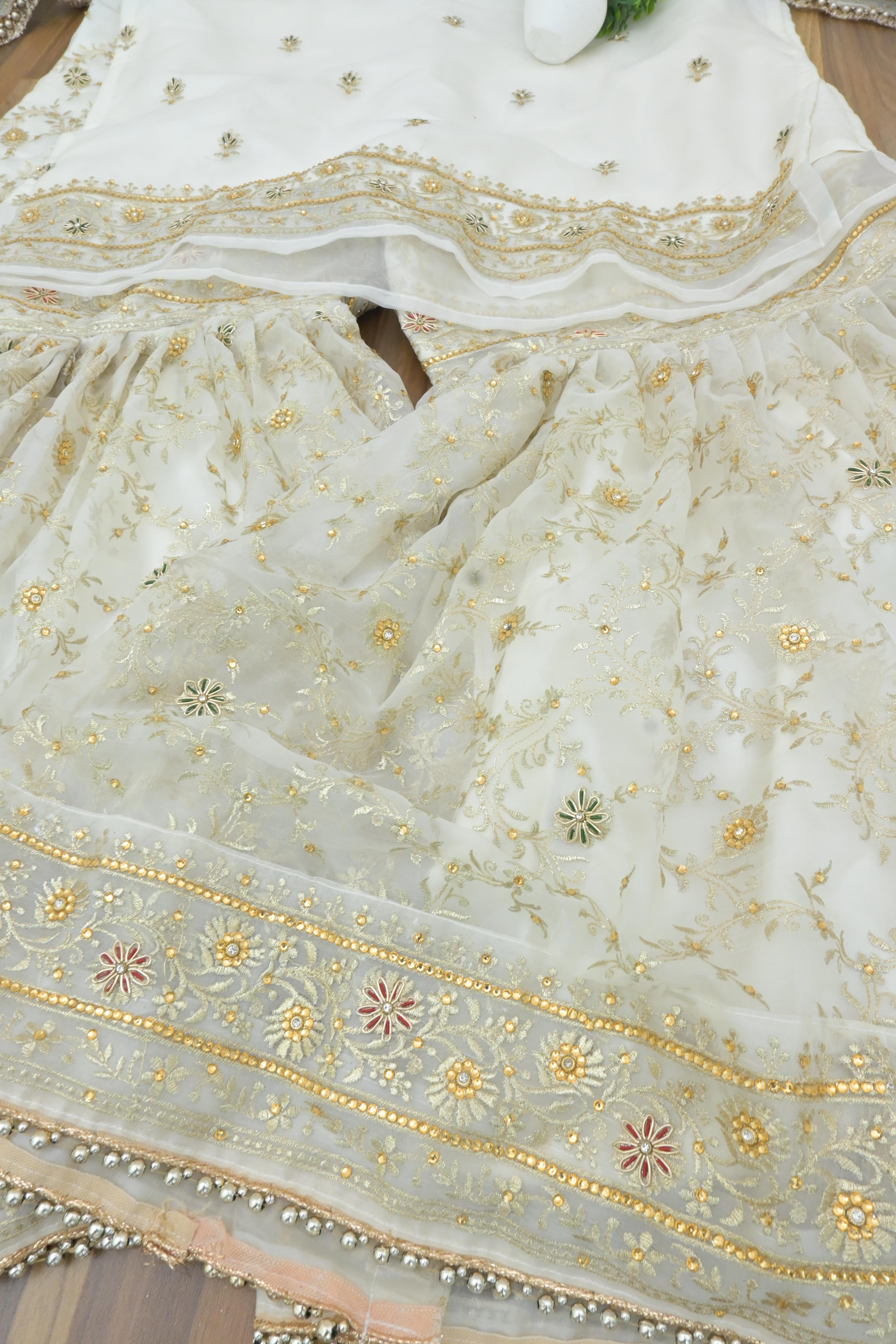 Off white handwork meenakari embroiderded gharara