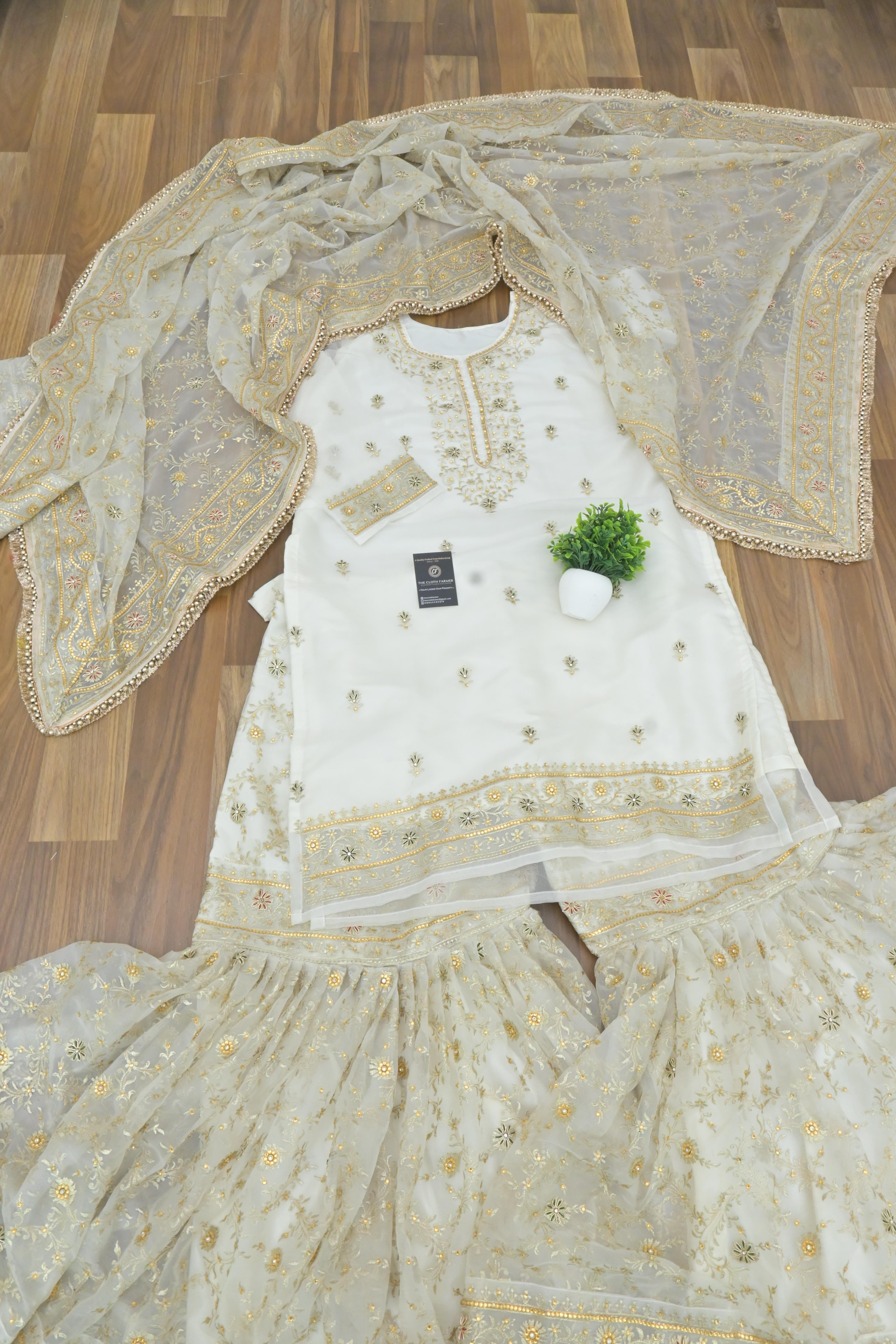 Off white handwork meenakari embroiderded gharara
