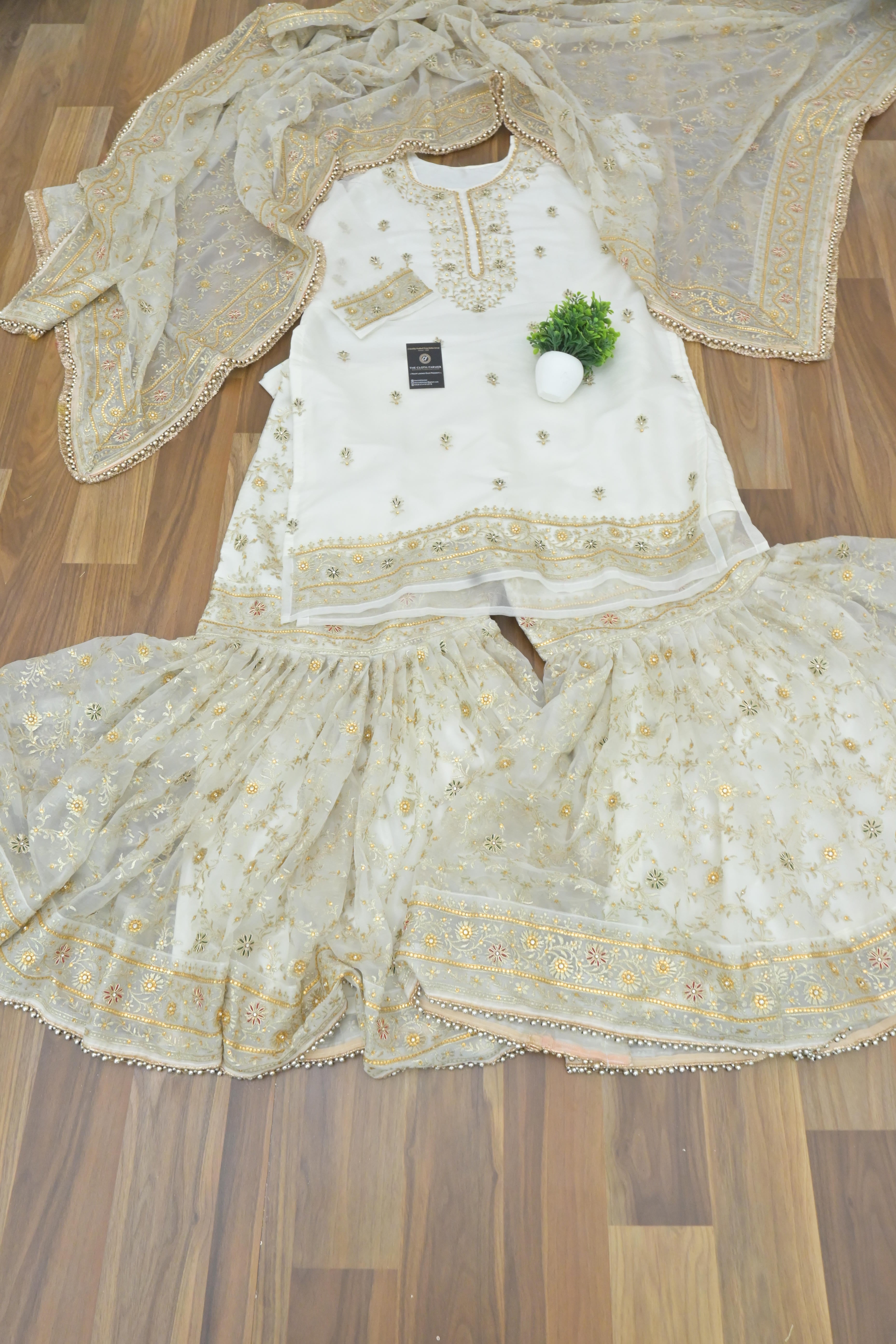 Off white handwork meenakari embroiderded gharara