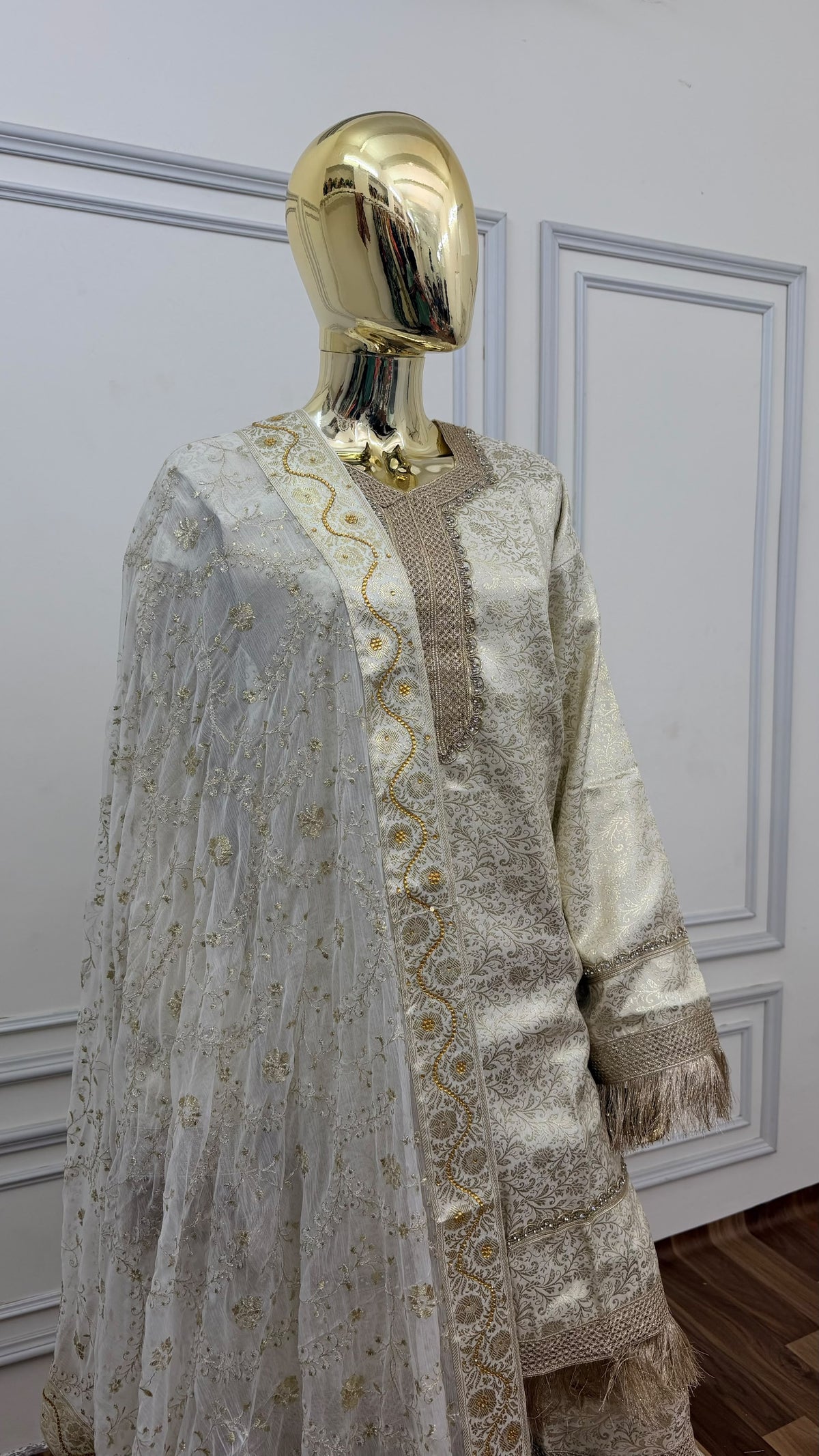 OF WHITE COLOR BANARASI KIMKHAB GHARARA WITH STONE WORK