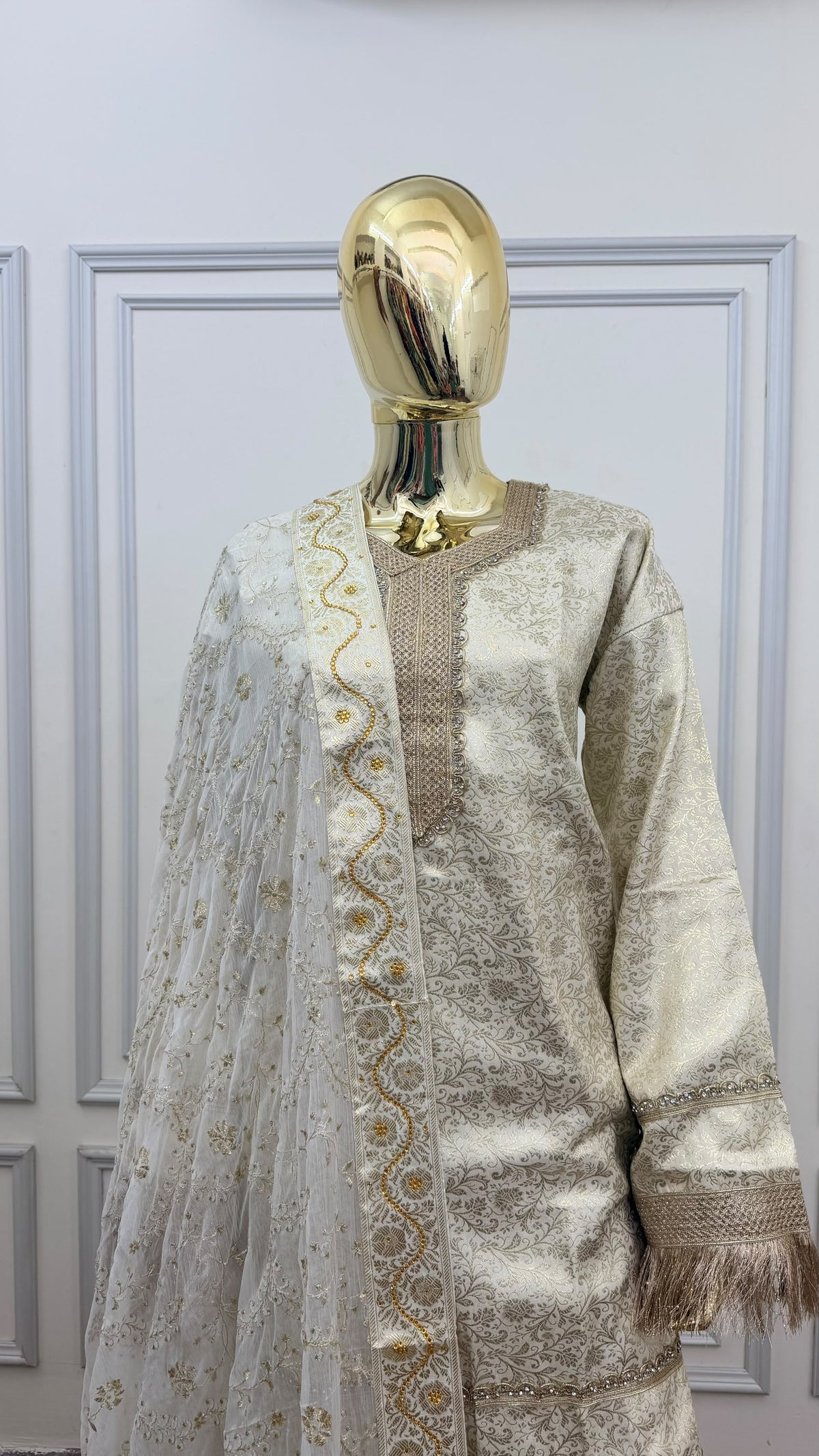 OF WHITE COLOR BANARASI KIMKHAB GHARARA WITH STONE WORK