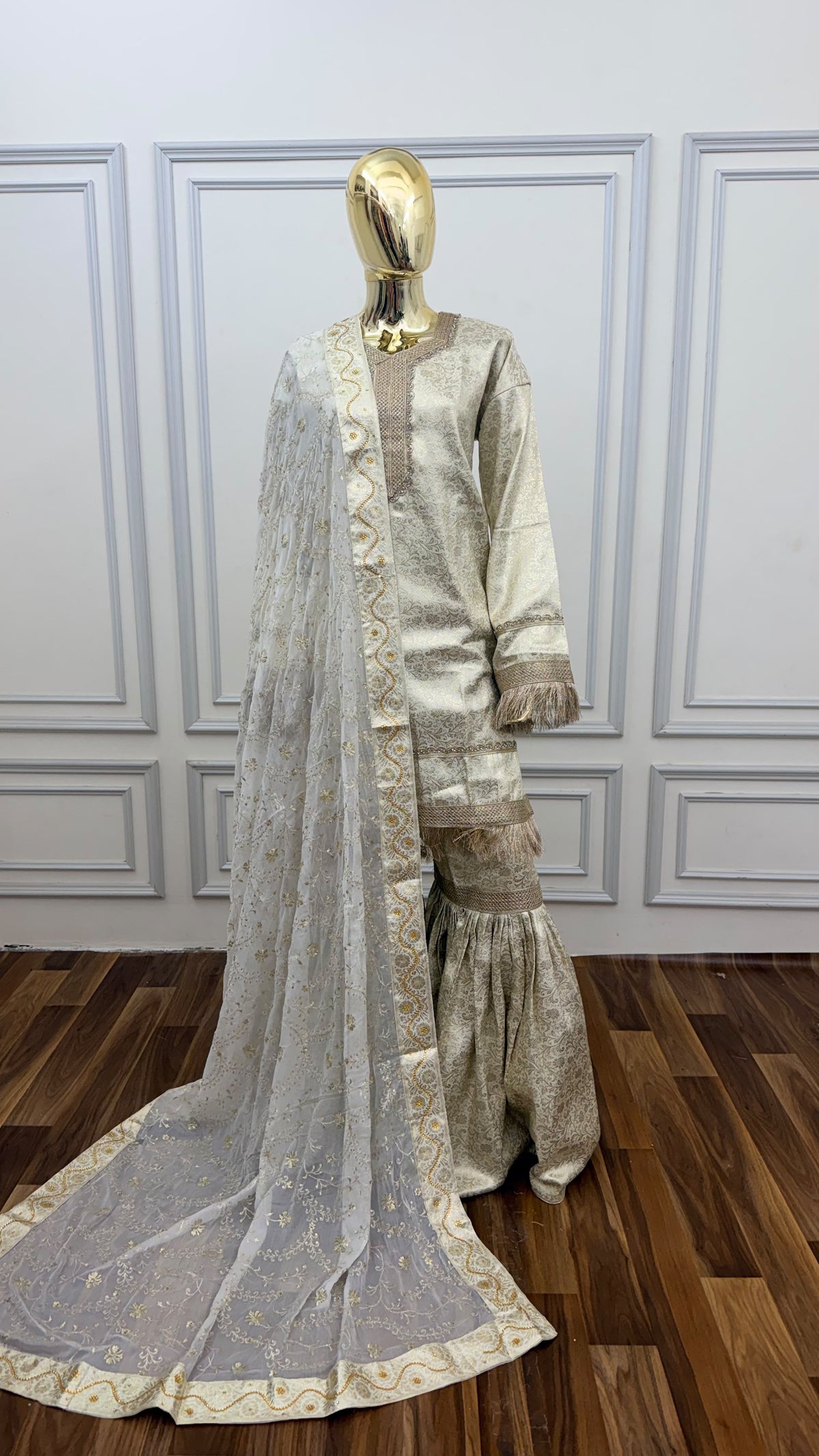 OF WHITE COLOR BANARASI KIMKHAB GHARARA WITH STONE WORK