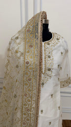 OFF WHITE EMBROERDED GHARARA WITH HAND WORK TOUCH