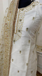 OFF WHITE EMBROERDED GHARARA WITH HAND WORK TOUCH