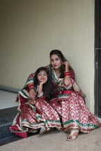 MAROON KIDS GHARARA WITH CONTRAST GREEN BORDER