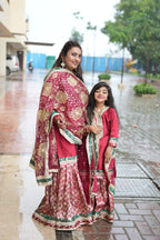 MAROON KIDS GHARARA WITH CONTRAST GREEN BORDER
