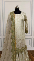 OFF WHITE BANARASI GHARARA WITH HEAVY BOARDER