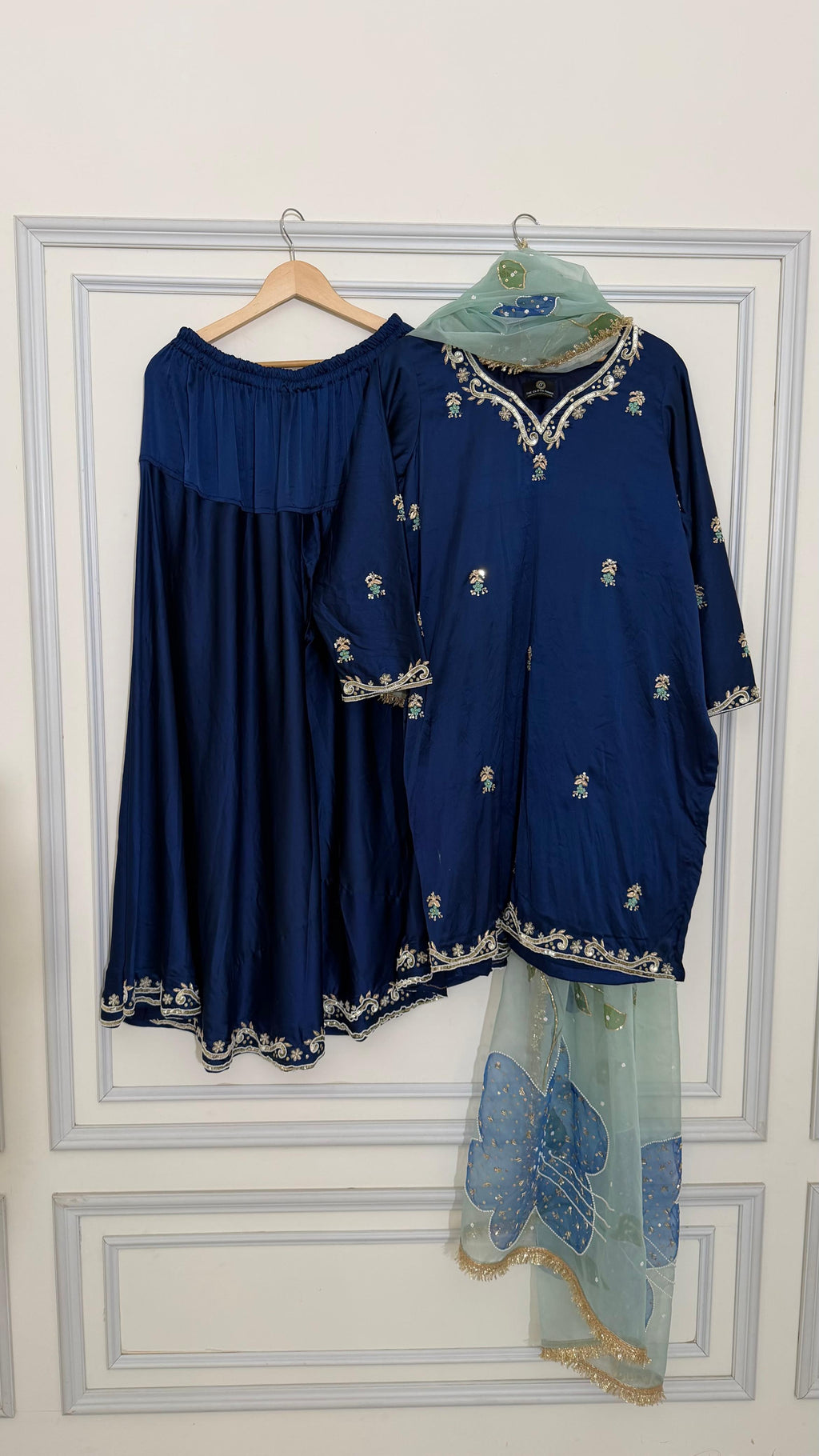 Neavy blue zardozi sharara with floral dupatta