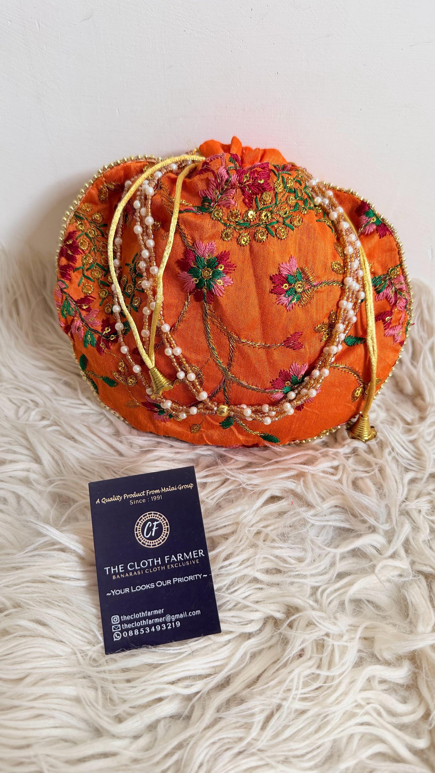 ORANGE COLOR BANARASI EMBROIDED POTLI