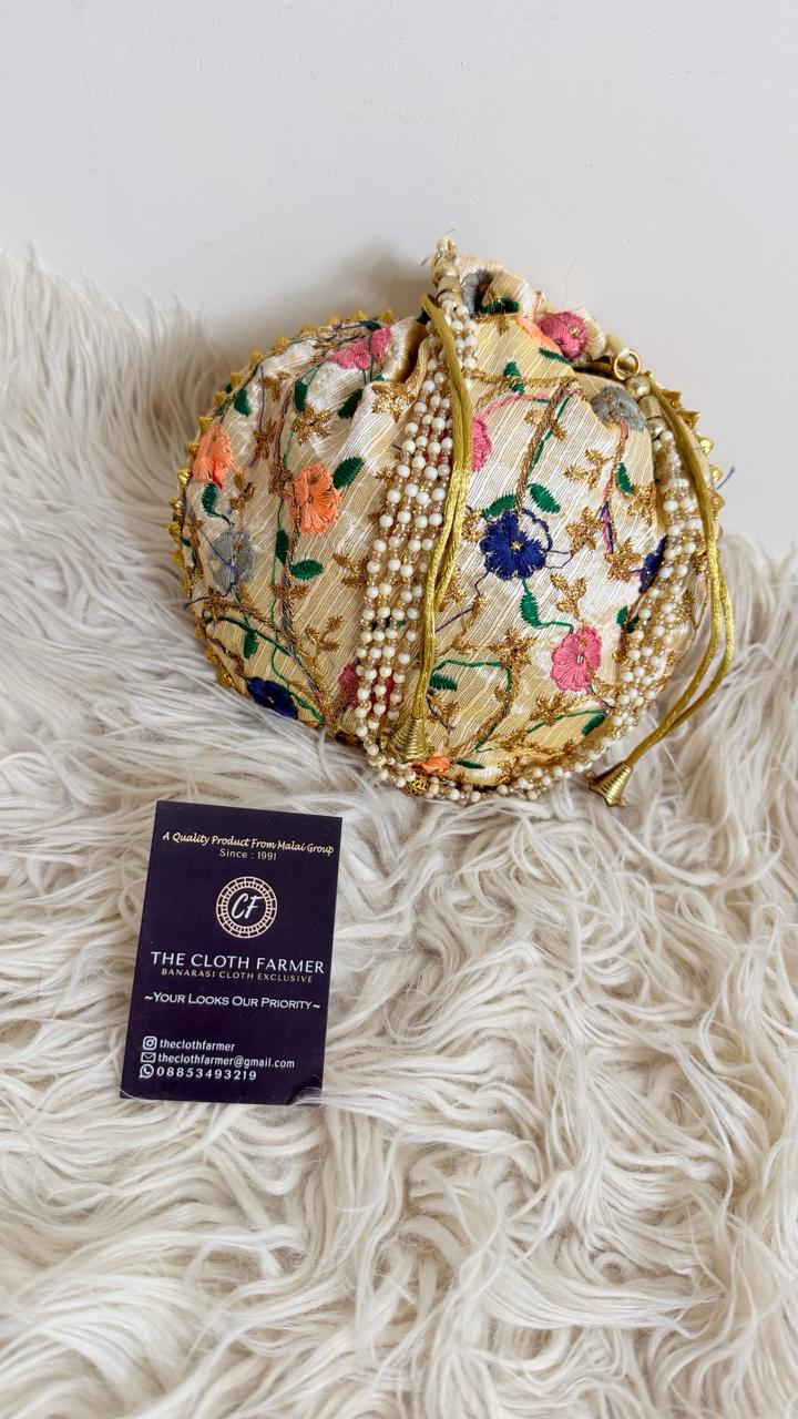 OFF WHITE COLOR EMBROIDED BANARASI POTLI