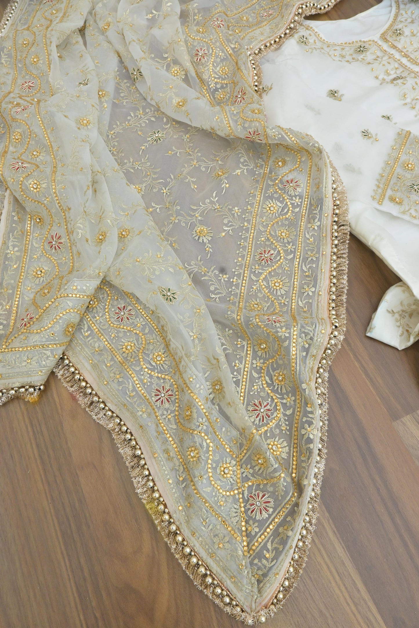 Off white handwork meenakari embroiderded gharara