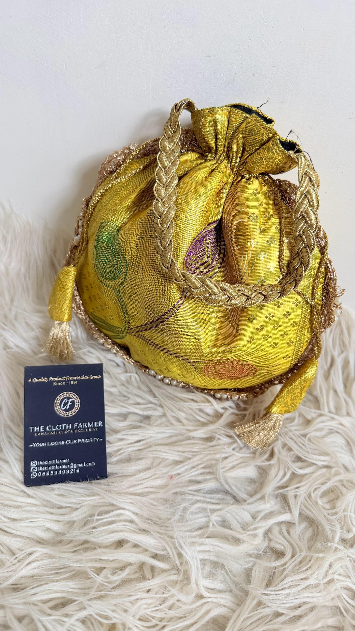 BANARASI YELLOW COLOR MORPANKHI POTLI