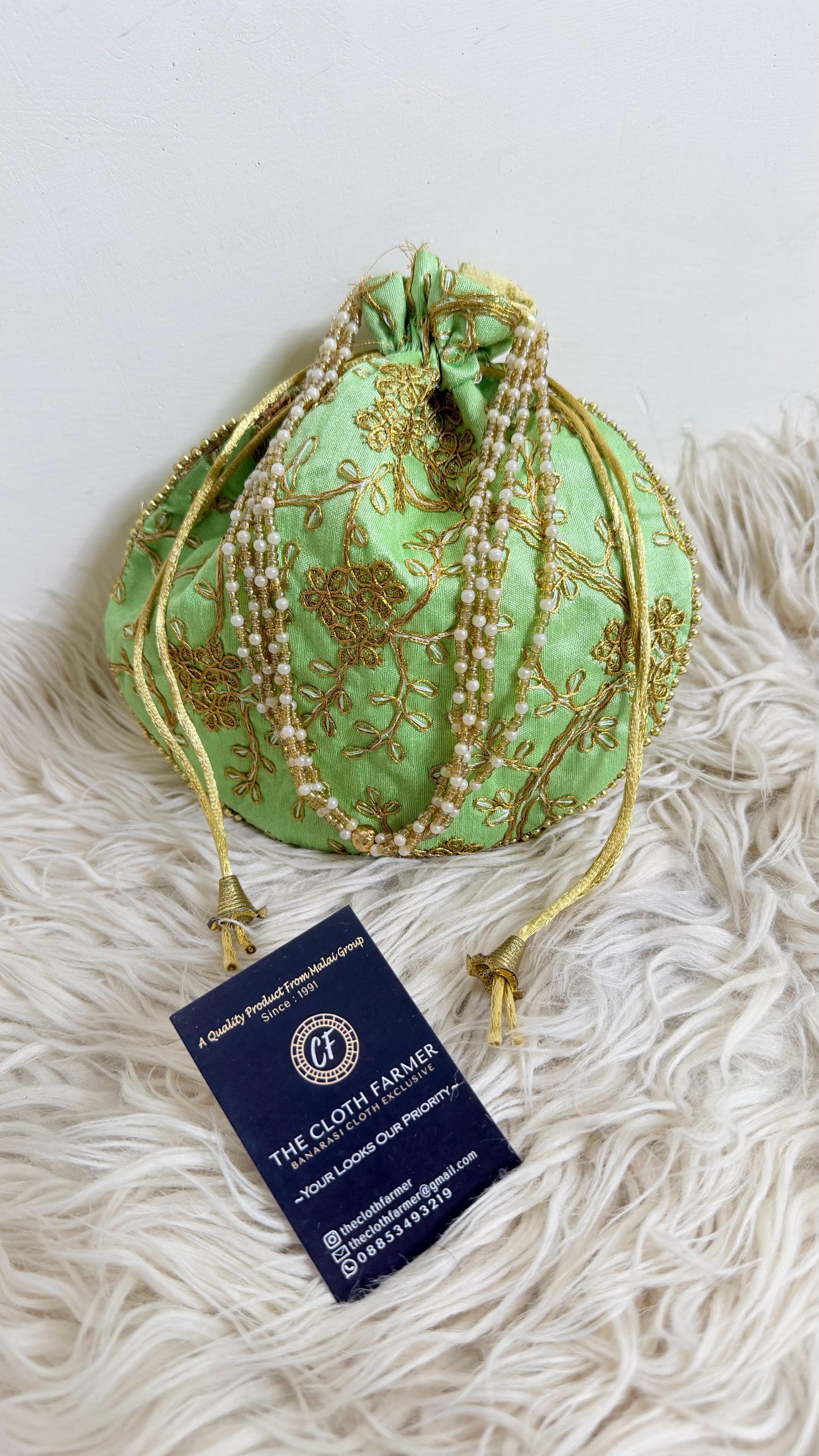 PISTA COLOR EMBROIDED BANARASI POTLI